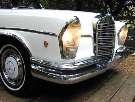 guise of the classically beautiful Mercedes Benz W111series motorcar